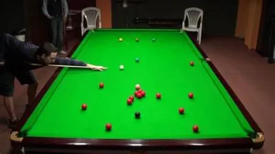 How do you make a century in snooker?