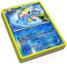 How do you tell if a pokémon card is holo or reverse?