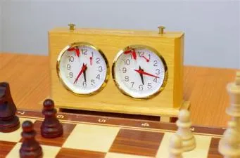 What does 40 moves in 2 hours mean chess?