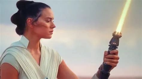 Why is reys lightsaber yellow?