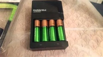 Why is my duracell aa battery charger blinking red?