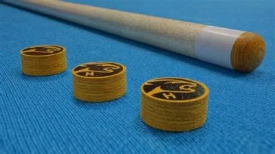 Should a pool cue tip be hard?