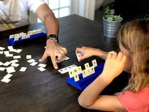 How many people can play rummikub at a time?