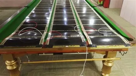 Why do snooker tables have heaters?