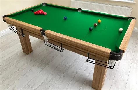 Which way should you brush a snooker table?