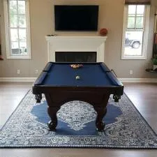 Should you put a rug under a pool table?