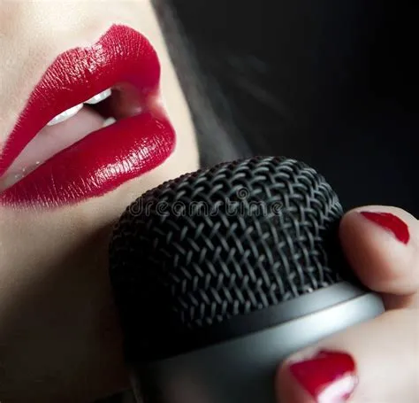 Should your lips touch the mic?