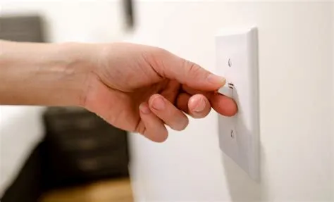 Why do light switches crackle?