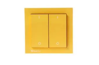 Why are light switches yellow?