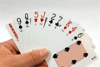 How many cards do you deal for two handed canasta?