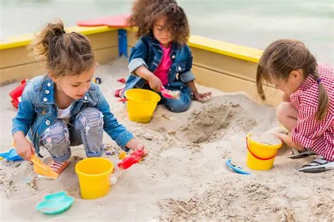 How old is mommy in the sandbox?