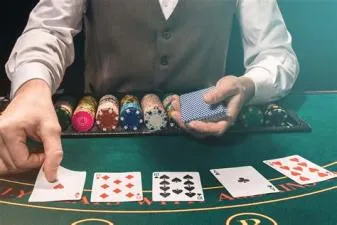 Does dealer win with 5 cards in blackjack?