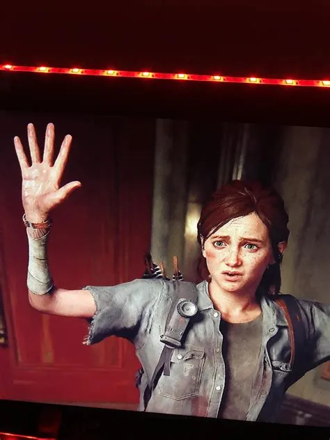 Why did ellie burn her arm?