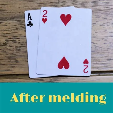 Can you discard a wild card when coming down in canasta?