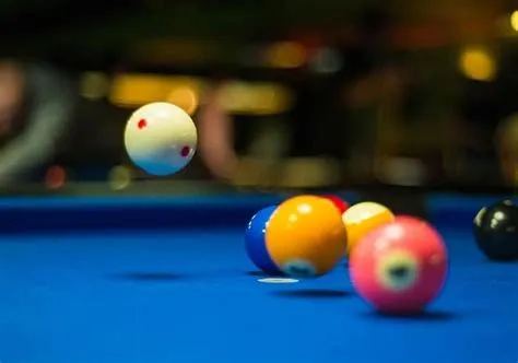 Why is scooping the cue ball illegal?