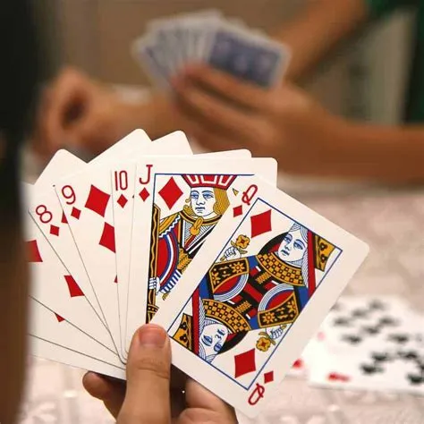 What is the name of the game playing with cards?