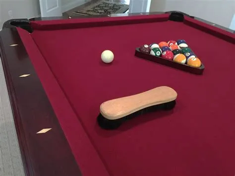 Should you vacuum pool table felt?