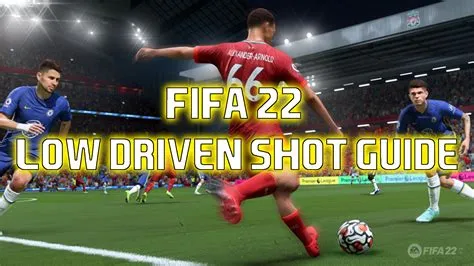 How do you shoot low and hard in fifa?