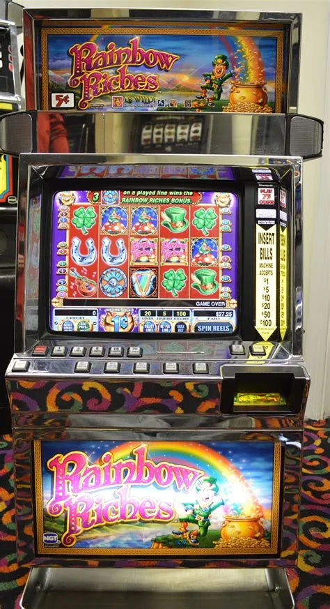 How are slot machines set to pay off?