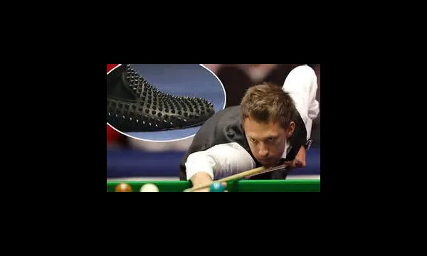 Why do snooker players wear long shoes?